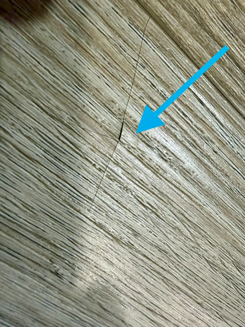 Nail penetration and raised area in LVP flooring