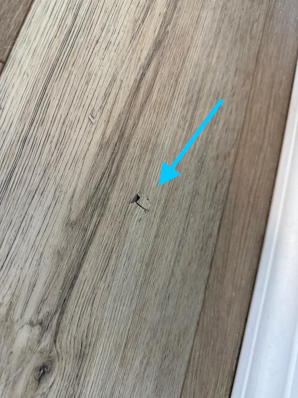 Further evidence of nail damage through floor surface